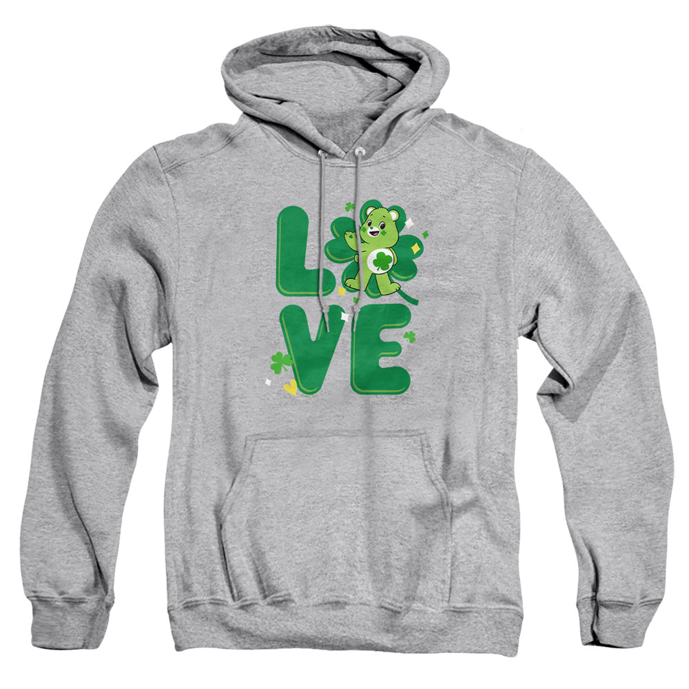 AN OFFCIALLY LICENSED CARE BEARS: UNLOCK THE MAGIC GOOD LUCK BEAR LOVE ST. PATRICK'S DAY ADULT UNISEX PULLOVER HOODIE ATHLETIC HEATHER