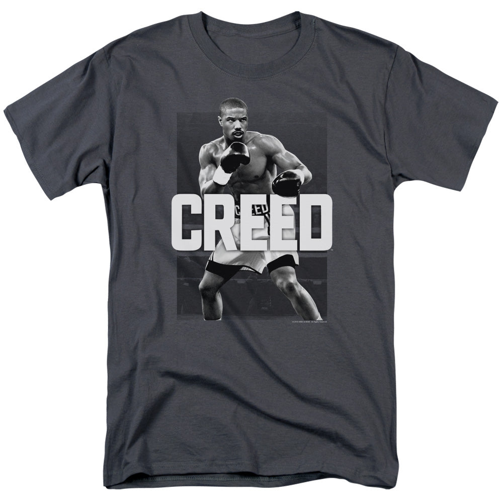 AN OFFCIALLY LICENSED CREED FINAL ROUND MEN'S REGULAR FIT T-SHIRT CHARCOAL