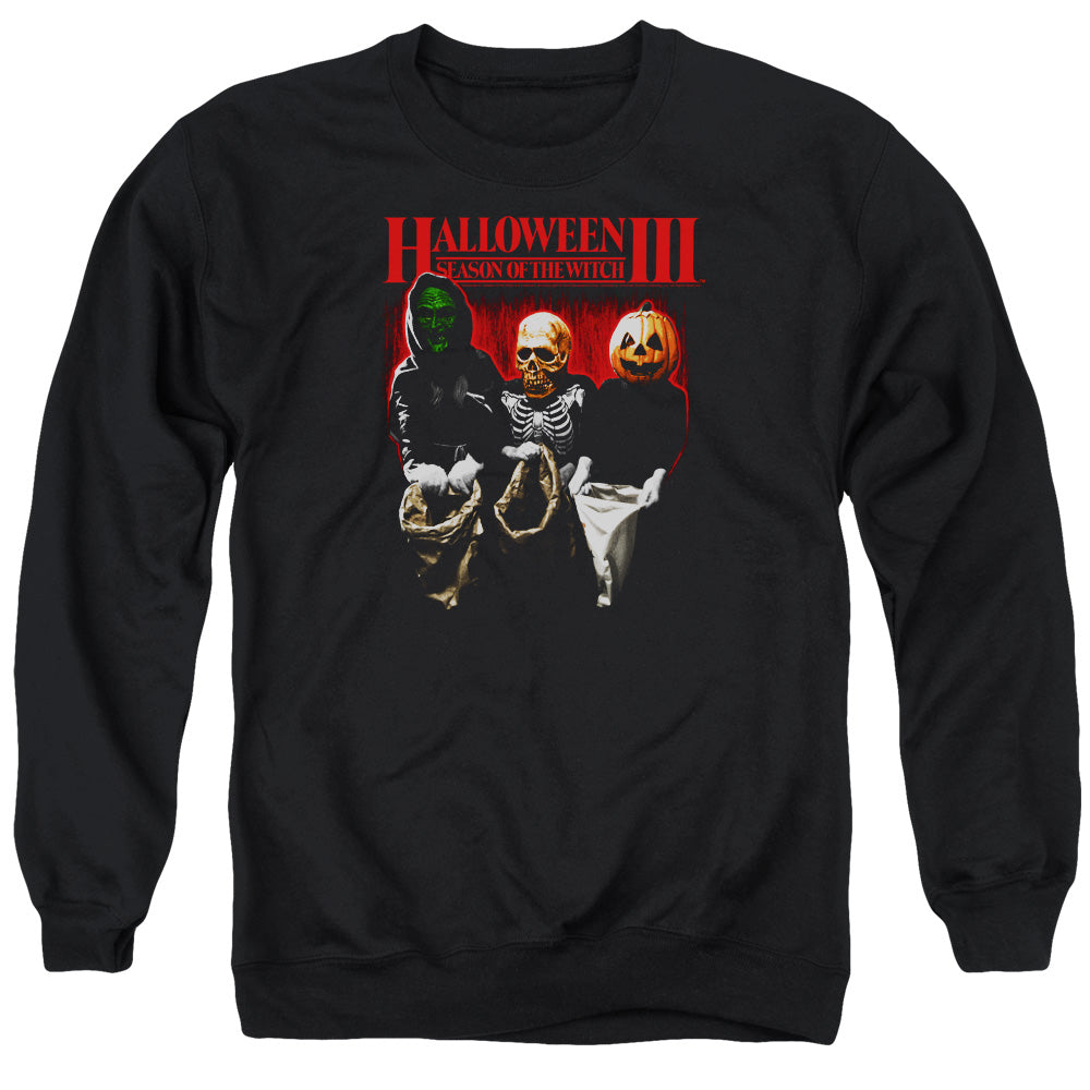 AN OFFCIALLY LICENSED HALLOWEEN III TRICK OR TREAT ADULT UNISEX CREWNECK SWEATSHIRT BLACK