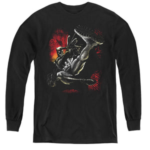 AN OFFCIALLY LICENSED BATMAN KICK SWING YOUTH LONG SLEEVE T-SHIRT BLACK