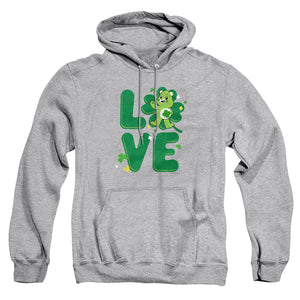 AN OFFCIALLY LICENSED CARE BEARS: UNLOCK THE MAGIC GOOD LUCK BEAR LOVE ST. PATRICK'S DAY ADULT UNISEX PULLOVER HOODIE ATHLETIC HEATHER