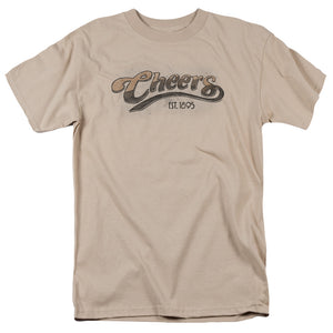 AN OFFCIALLY LICENSED CHEERS WATERCOLOR LOGO MEN'S REGULAR FIT T-SHIRT SAND