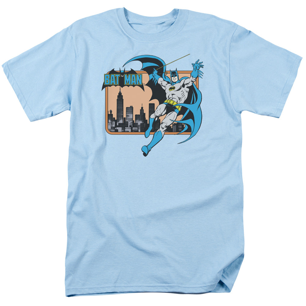 AN OFFCIALLY LICENSED DC BATMAN BATMAN IN THE CITY MEN'S REGULAR FIT T-SHIRT LIGHT BLUE