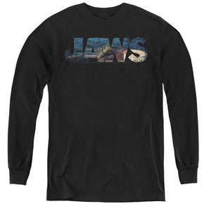 AN OFFCIALLY LICENSED JAWS LOGO CUTOUT YOUTH LONG SLEEVE T-SHIRT BLACK