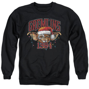 AN OFFCIALLY LICENSED GREMLINS VARSITY CHRISTMAS ADULT UNISEX CREWNECK SWEATSHIRT BLACK